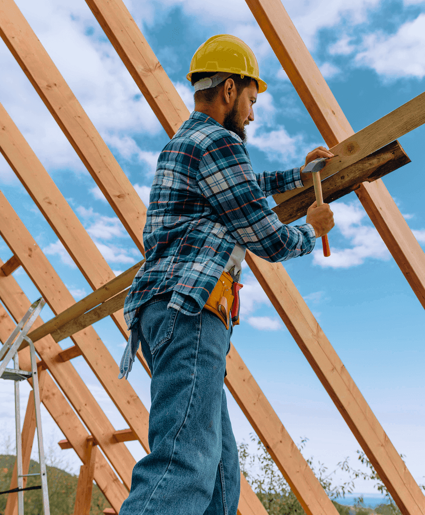 Roofer fixing roof